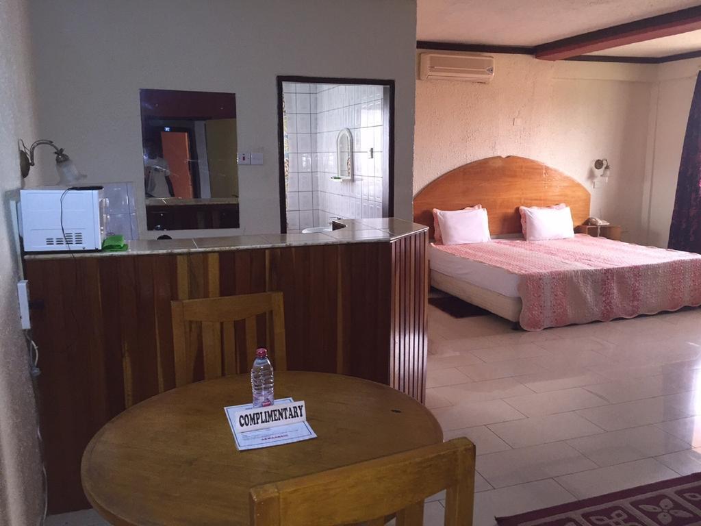 Hotel De Texas Кумасі Номер фото